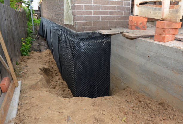 Happy homeowners after waterproofing job in Noblesville